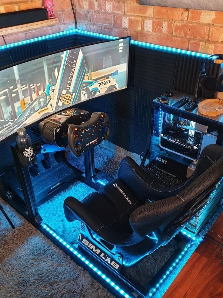 Sim racing cockpit with wheel and monitors